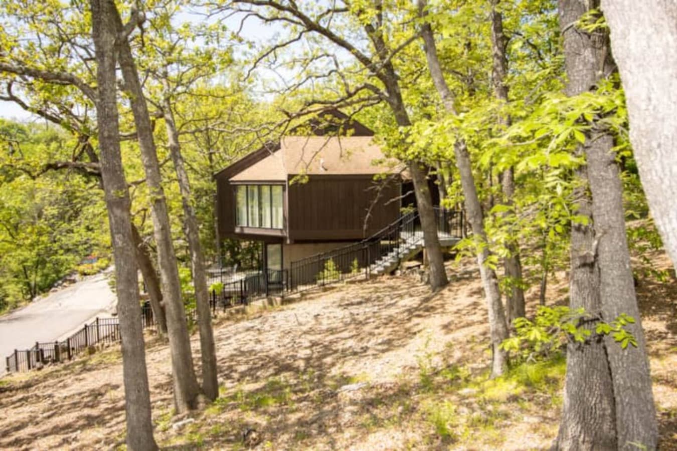 Treetop 52 offers cozy, elevated living surrounded by peaceful nature—your perfect Lake of the Ozarks escape.
