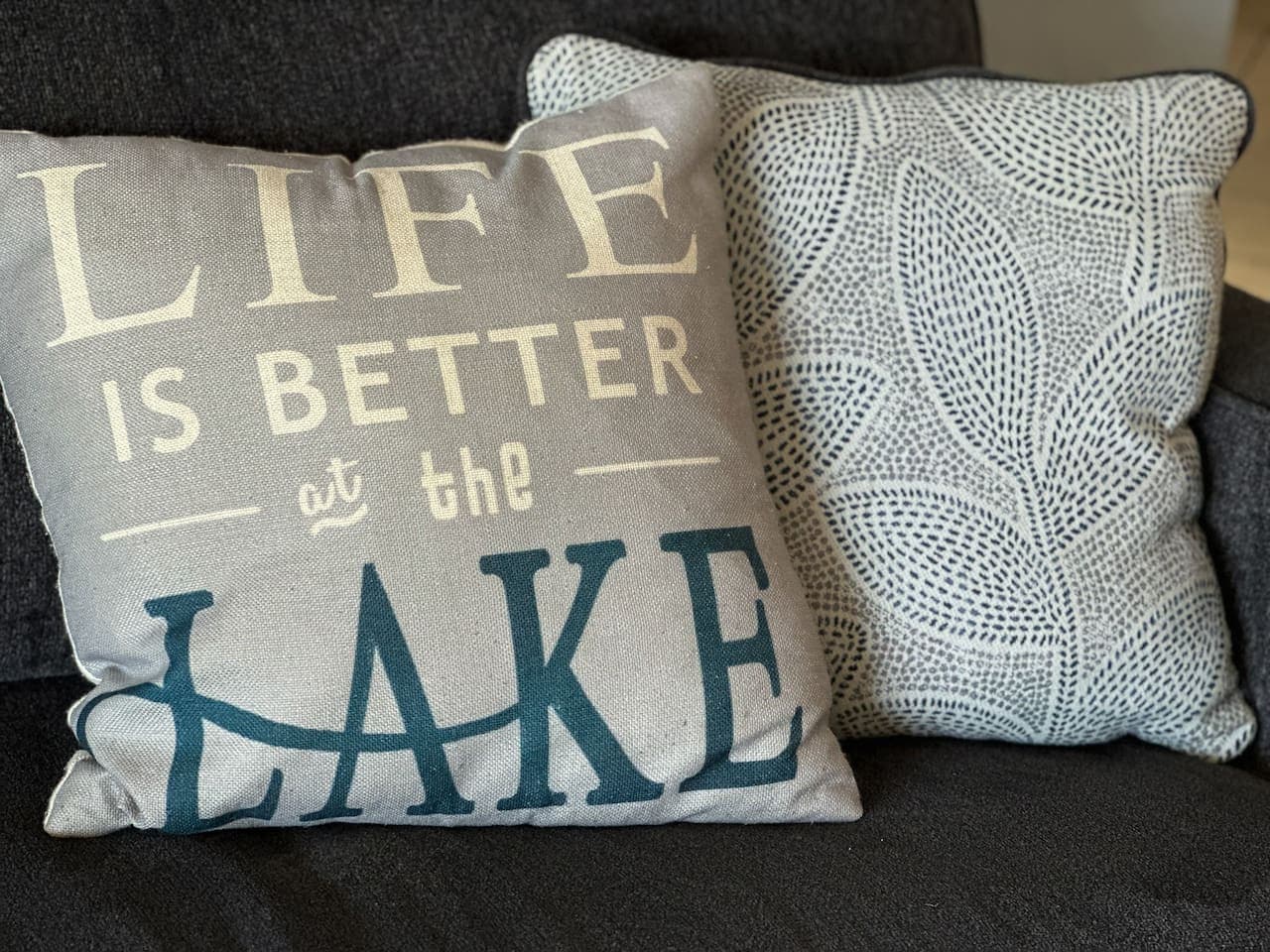 Thoughtful touches like "Life is Better at the Lake" and "Lovin’ Life at the Lake" pillows bring the perfect vacation vibe.