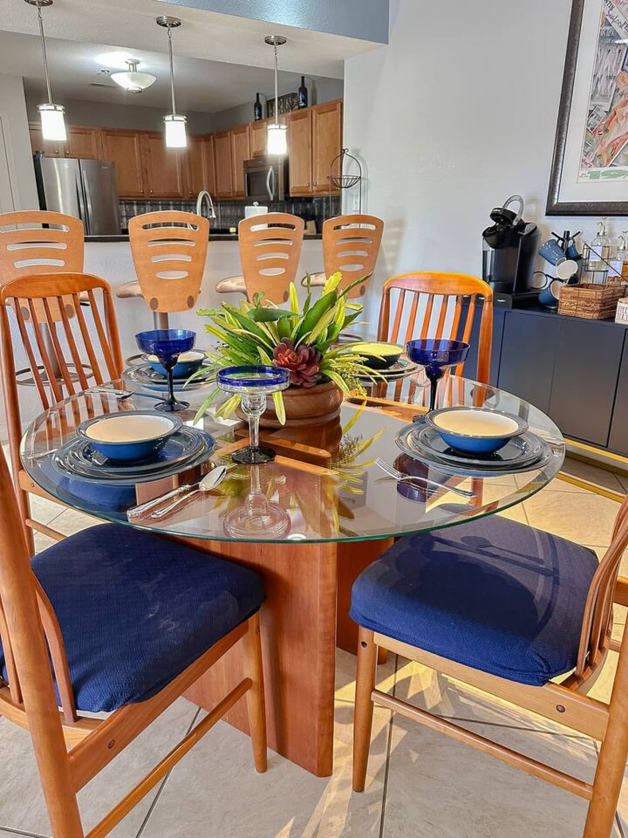 The perfect blend of comfort and functionality, with bar seating at the kitchen counter and a stylish dining space nearby for a seamless entertaining experience.