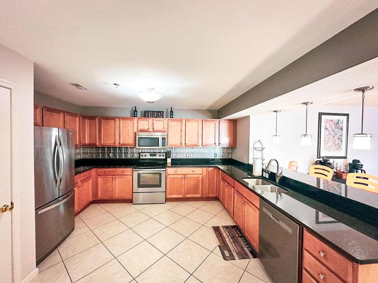 Enjoy the large prep space and upgraded finishes in this fully stocked kitchen, perfect for group meals and entertaining.