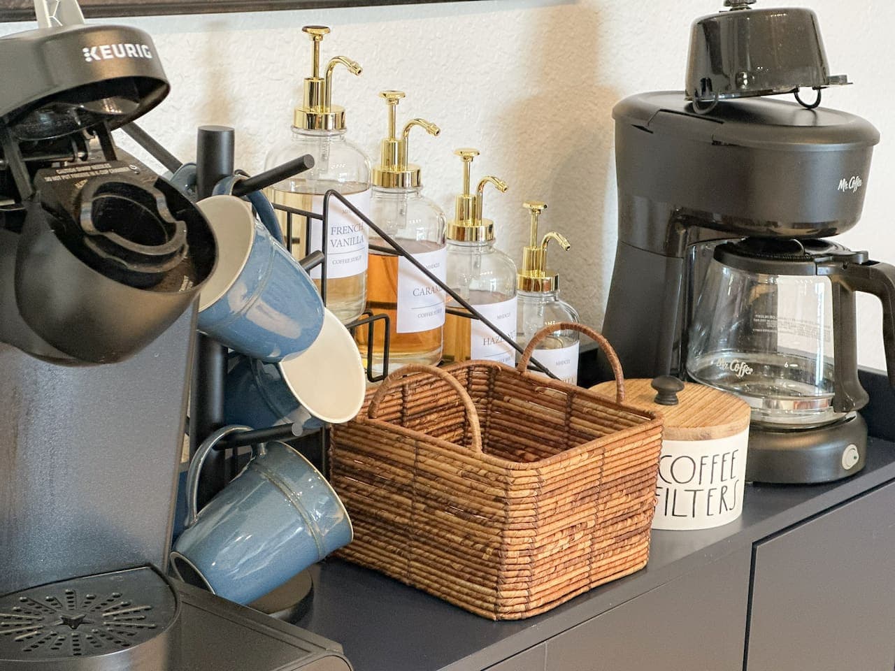 A thoughtful touch with French Vanilla & Caramel syrups, fresh coffee filters, and stylish blue mugs.