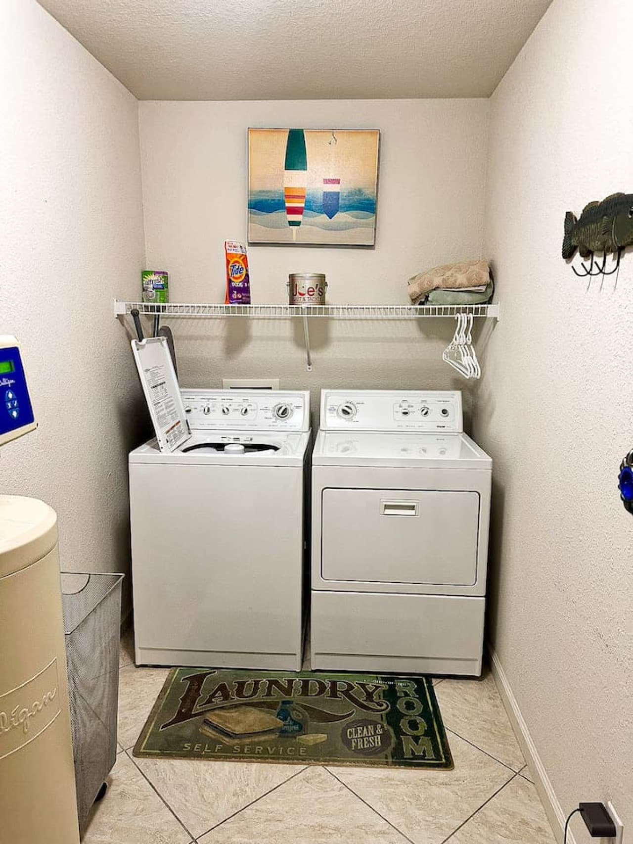 A fully equipped laundry area with a washer, dryer, and detergent provided—ideal for longer stays or freshening up after a day on the lake.