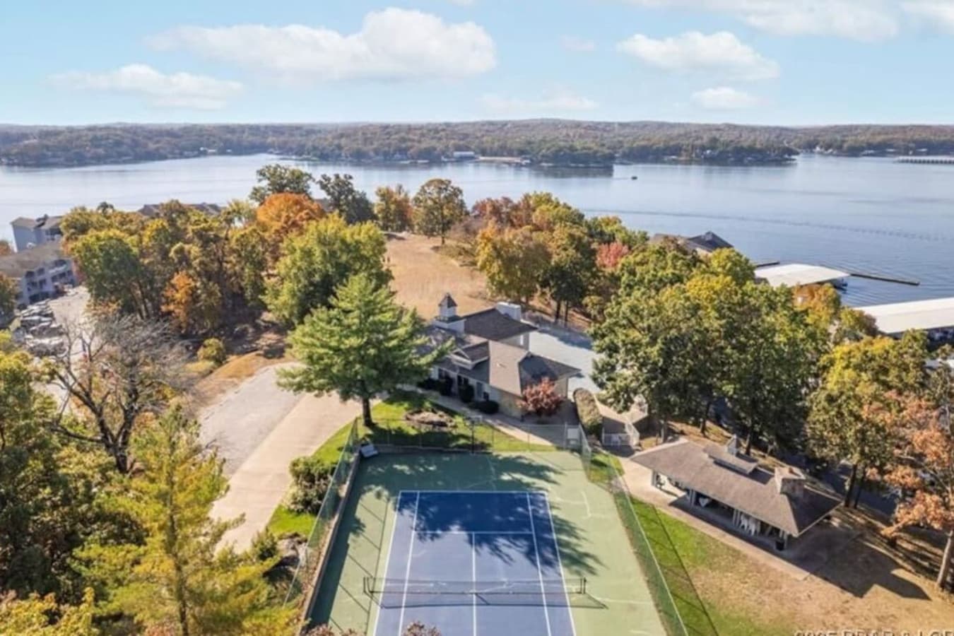 Challenge your friends to a game of tennis while soaking in the breathtaking views of the lake and surrounding nature.