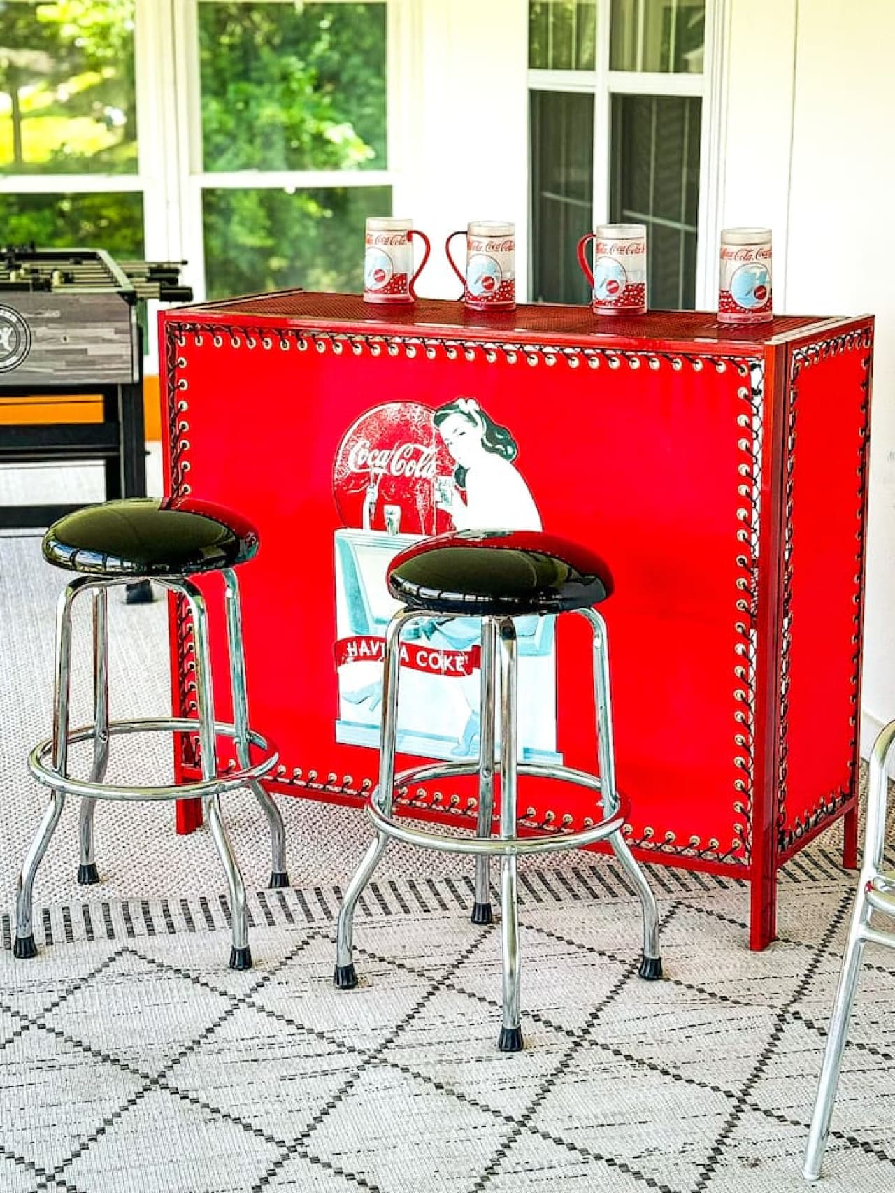 Vintage-inspired bar counter featuring classic Cola design—perfect for mixing drinks or simply soaking in the retro vibes.