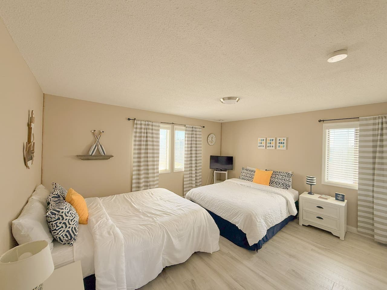 Queen comfort in every corner—perfect for families or friends.