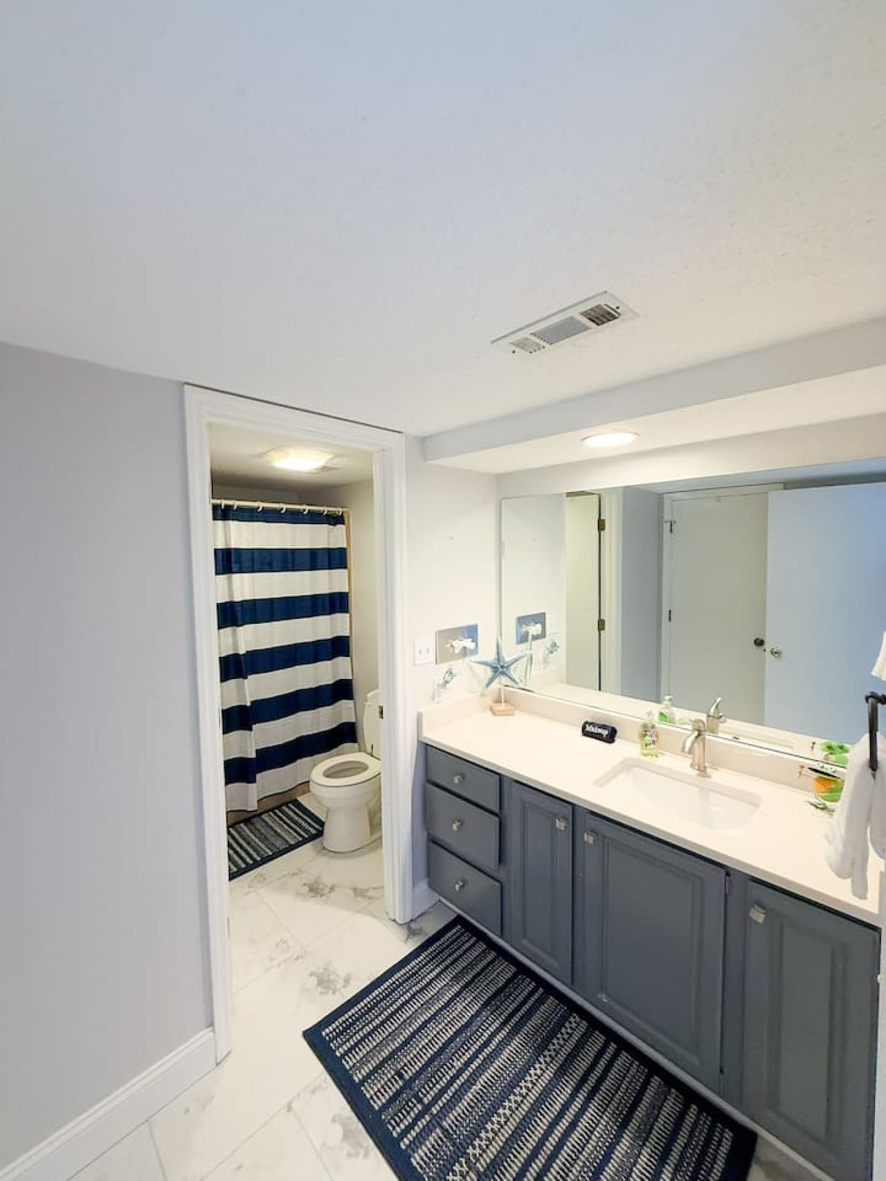 Features a shower/tub combo, spacious vanity, and toilet—perfect for families or groups who need added comfort and convenience.