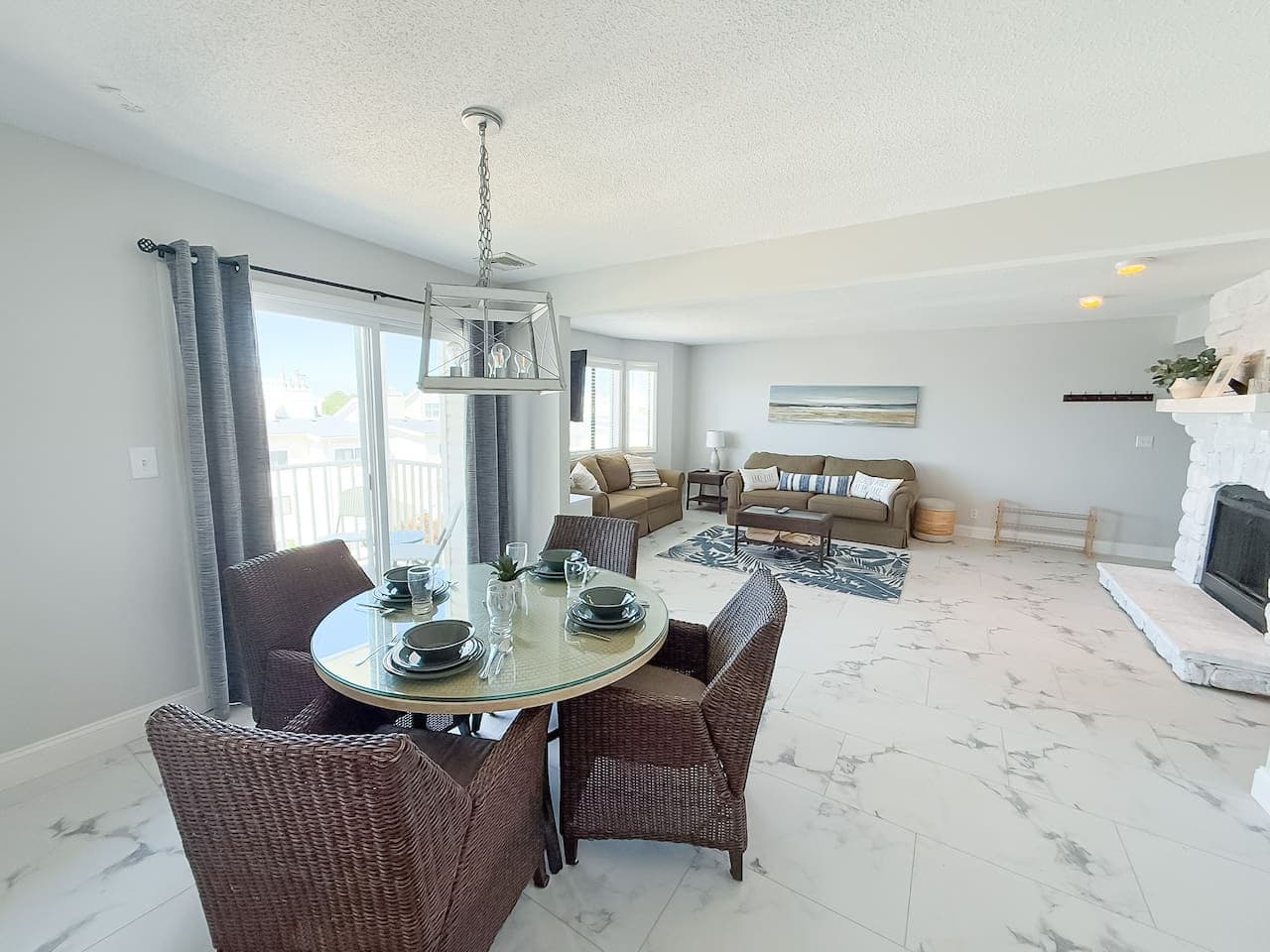 Bask in open-concept comfort with stunning lake and pool views right from your living space.
