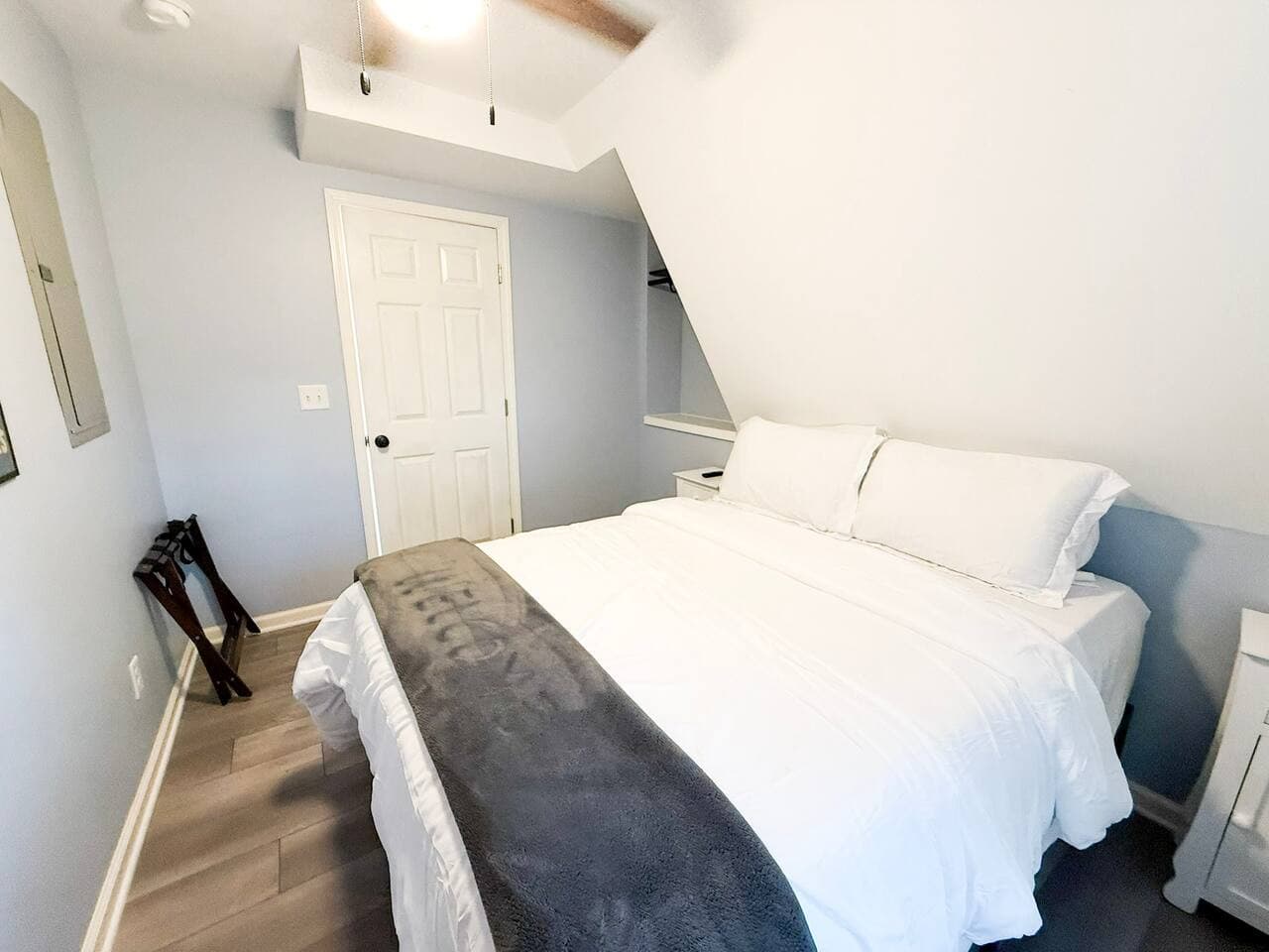 Main floor bedroom with one queen bedroom