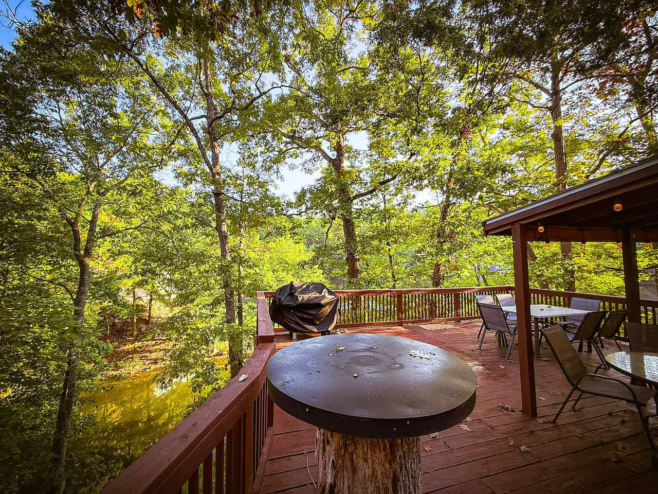 Upper level deck offers a grill and seating perfect for meals.