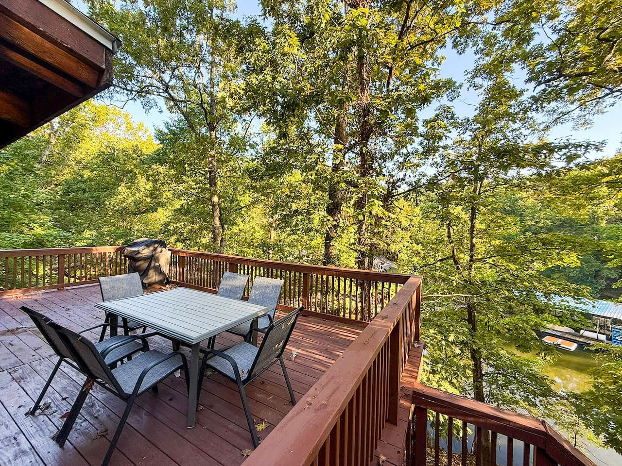 Dining and Grill area off the main floor of the house, private deck.