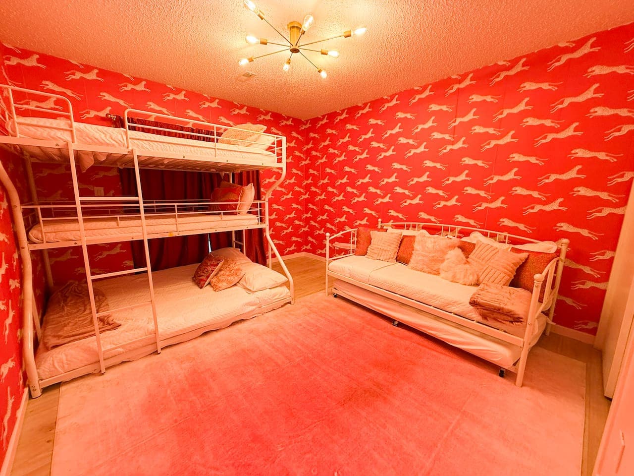 Bunk room, 1 queen bed, 1 full bed and 3 twin beds