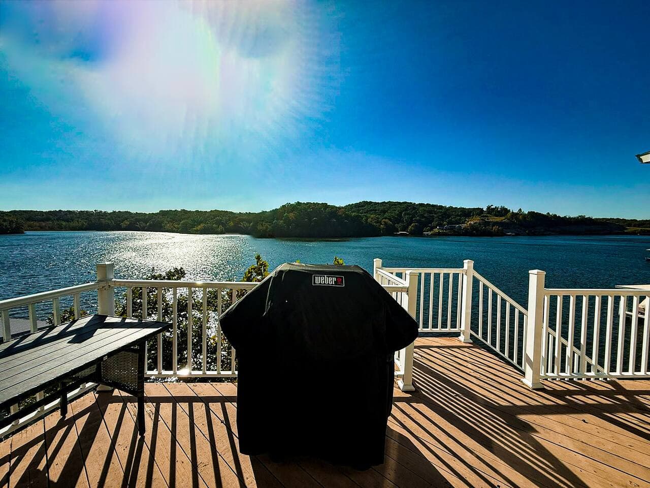 Spacious deck with panoramic lake views.