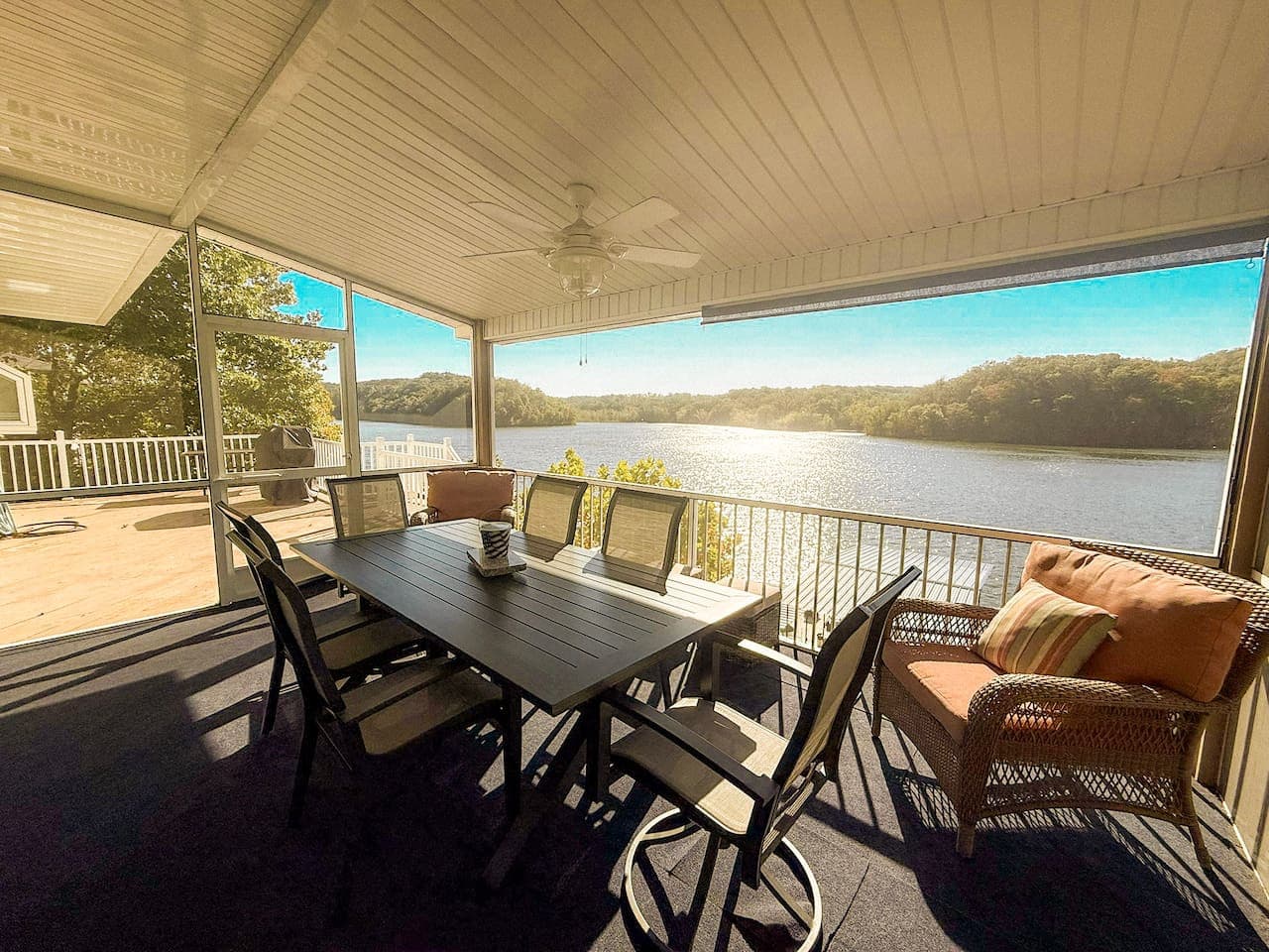 Relax on the screened deck with panoramic lake views.