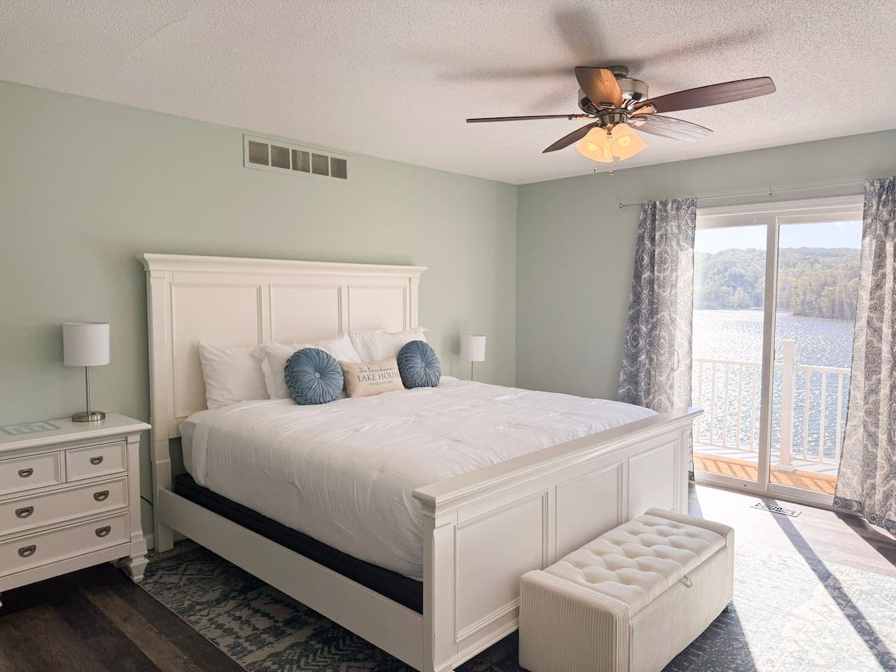 Relax in the serene master suite with balcony access.
