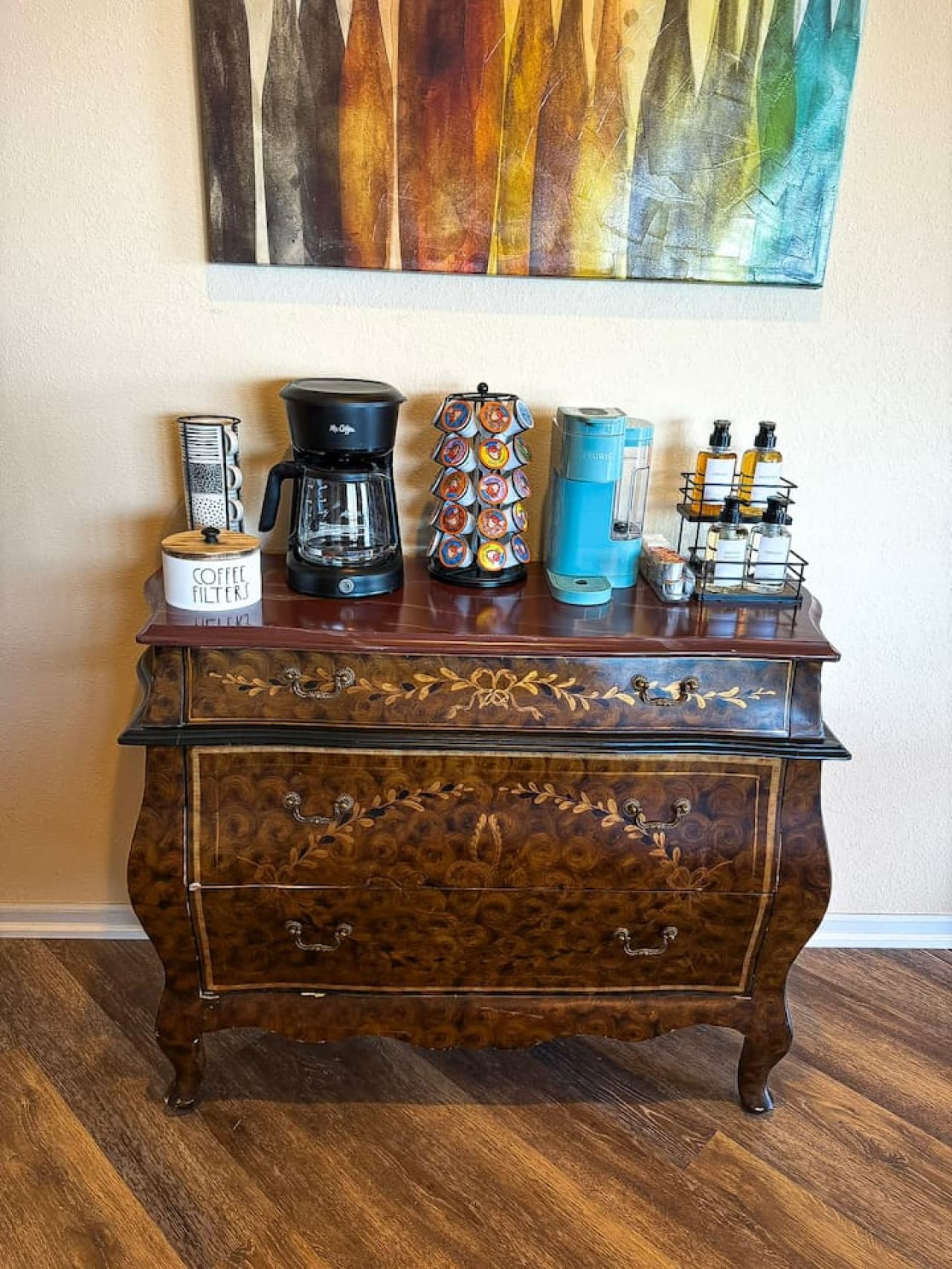 Start your day at the fully stocked coffee and refreshment station, complete with premium brews and thoughtful essentials.