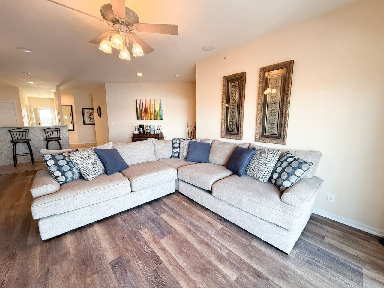 Stretch out and settle into this spacious, sunlit living room designed for comfort after a day on the lake.