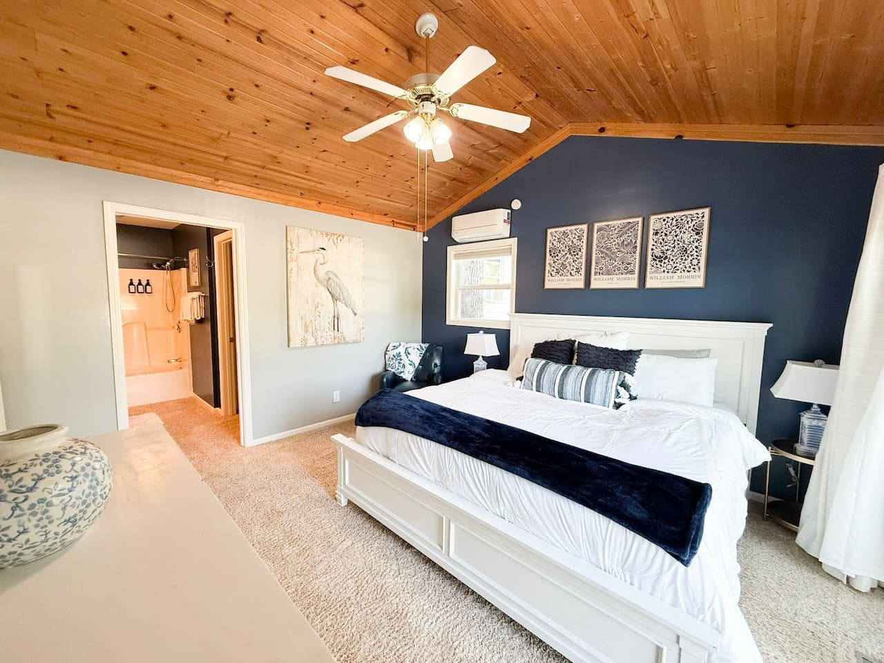 Master bedroom with 1 king bed and attached bathroom.