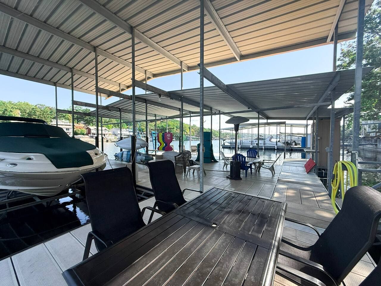 Additional dining space and firepit on the dock.  This is how we Lakecation Vacation.