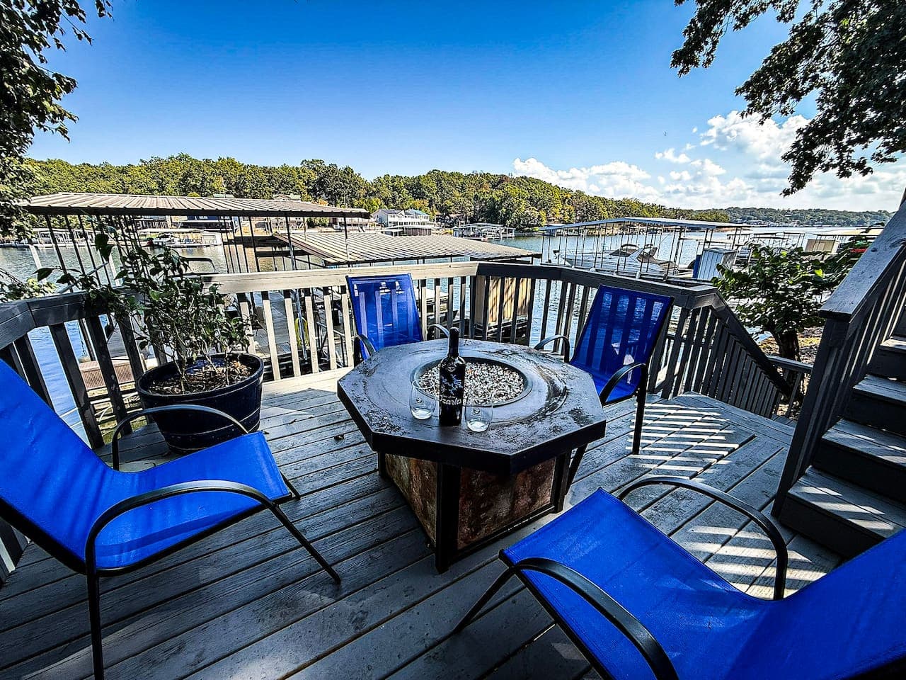 Private deck with Lakefront Firepit, wind down and watch the sunset with a bottle of wine.