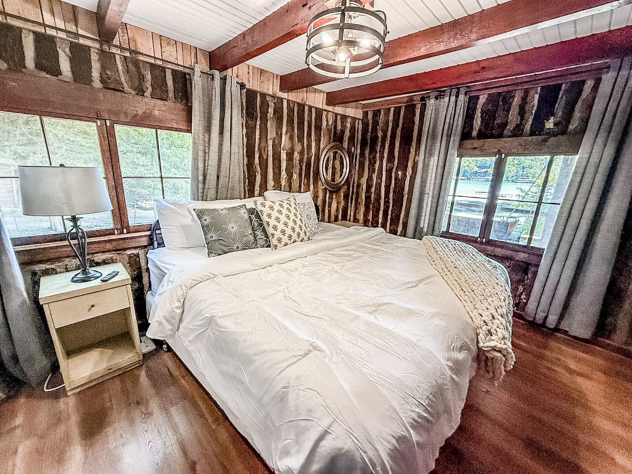 Drift off in comfort—each bedroom at Birdies Lodge is designed for restful nights and lake-filled dreams