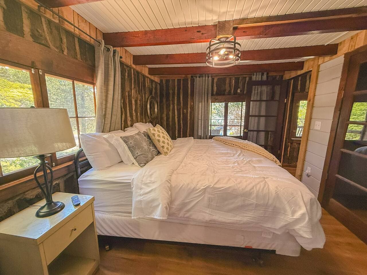Serene bedrooms with just the right touch of lake charm—your private escape at Birdies Lodge.