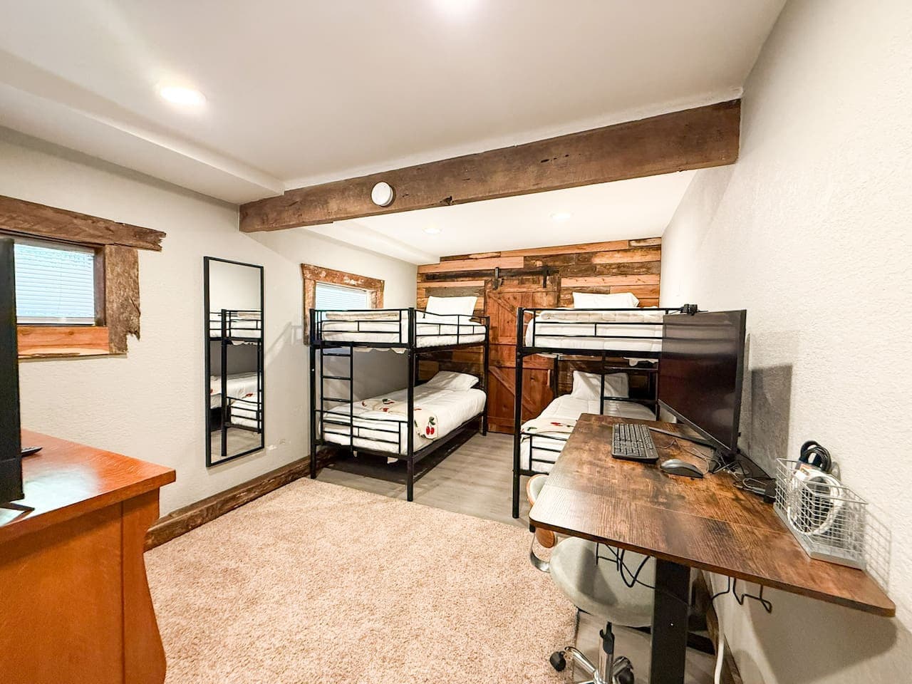 Sleepover style! Bunk beds make this space perfect for families or friends.