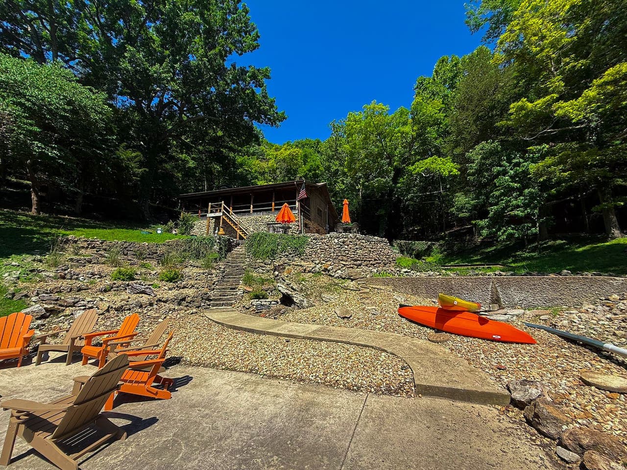 Lakeside lodge vibes with outdoor seating that wraps you in warmth and woodsy charm.