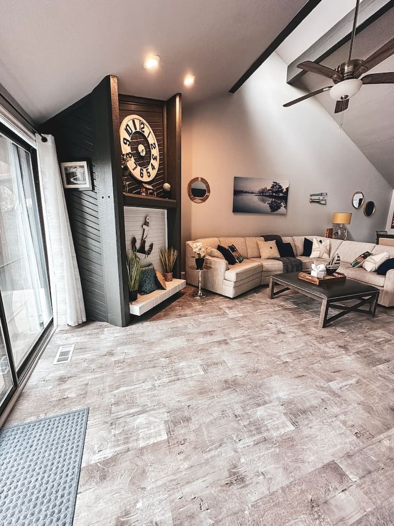 A welcoming living space with an airy vaulted ceiling, perfect for relaxing or entertaining.
