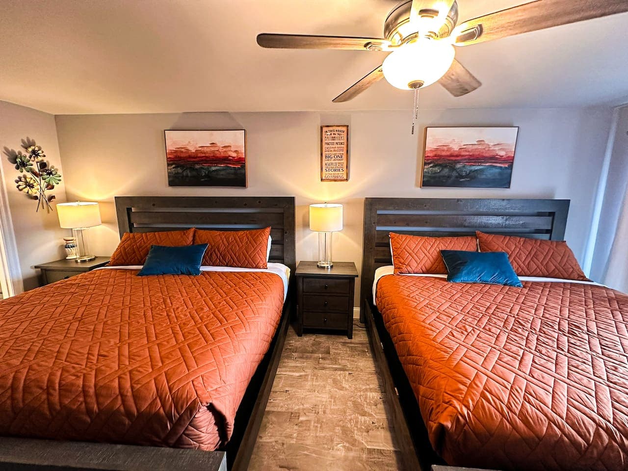 Symmetrical view of the bedroom with two king beds, perfect for families or groups seeking both luxury and relaxation.