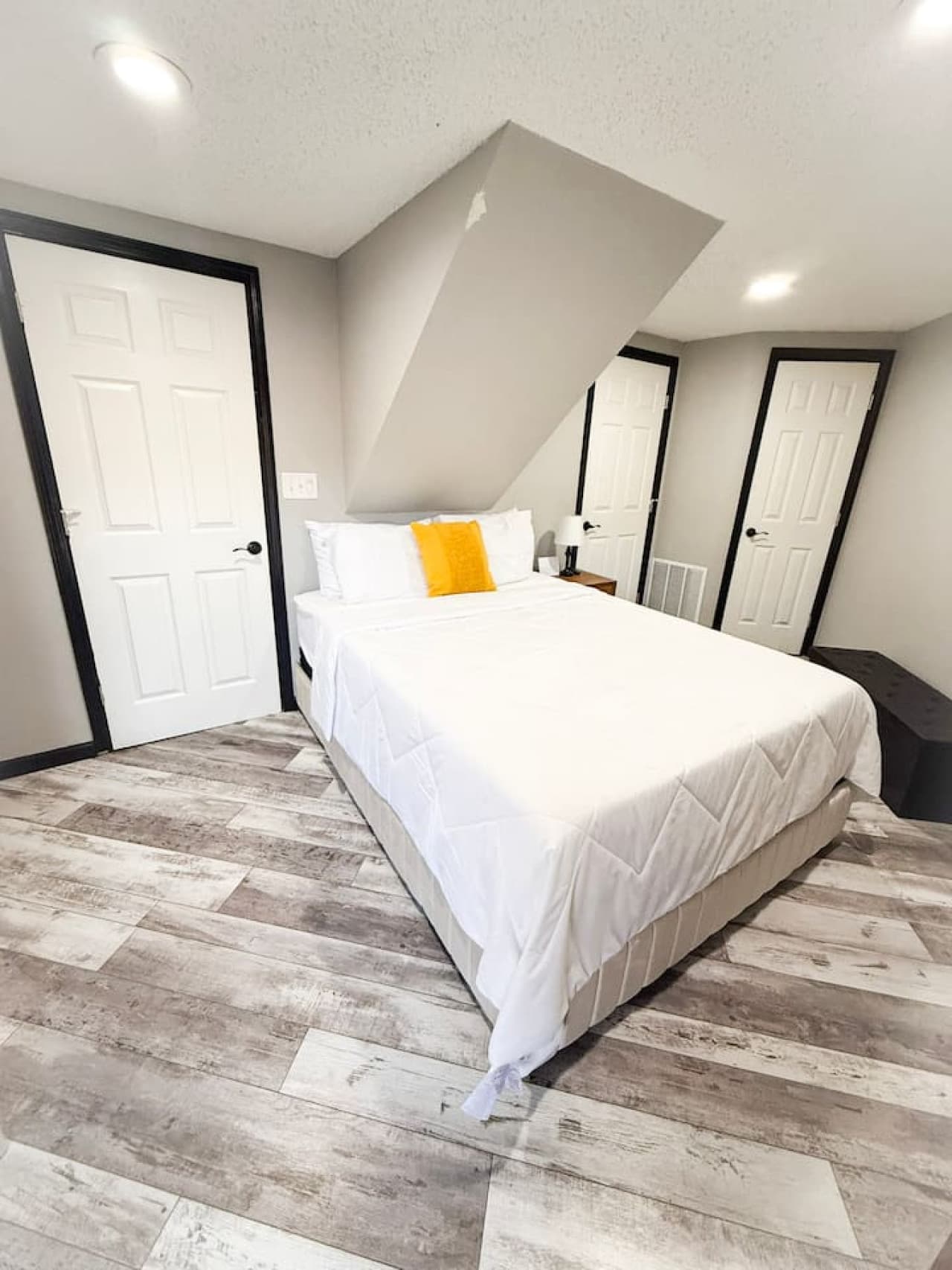 Modern bedroom with plenty of space to relax and unwind.