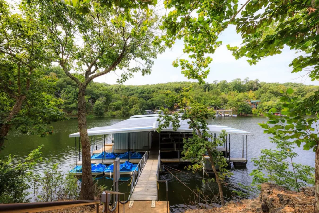 Covered boat dock with easy water access for your adventures.
