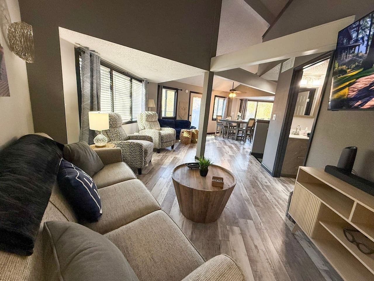 Bright open living space with cozy seating and modern décor.