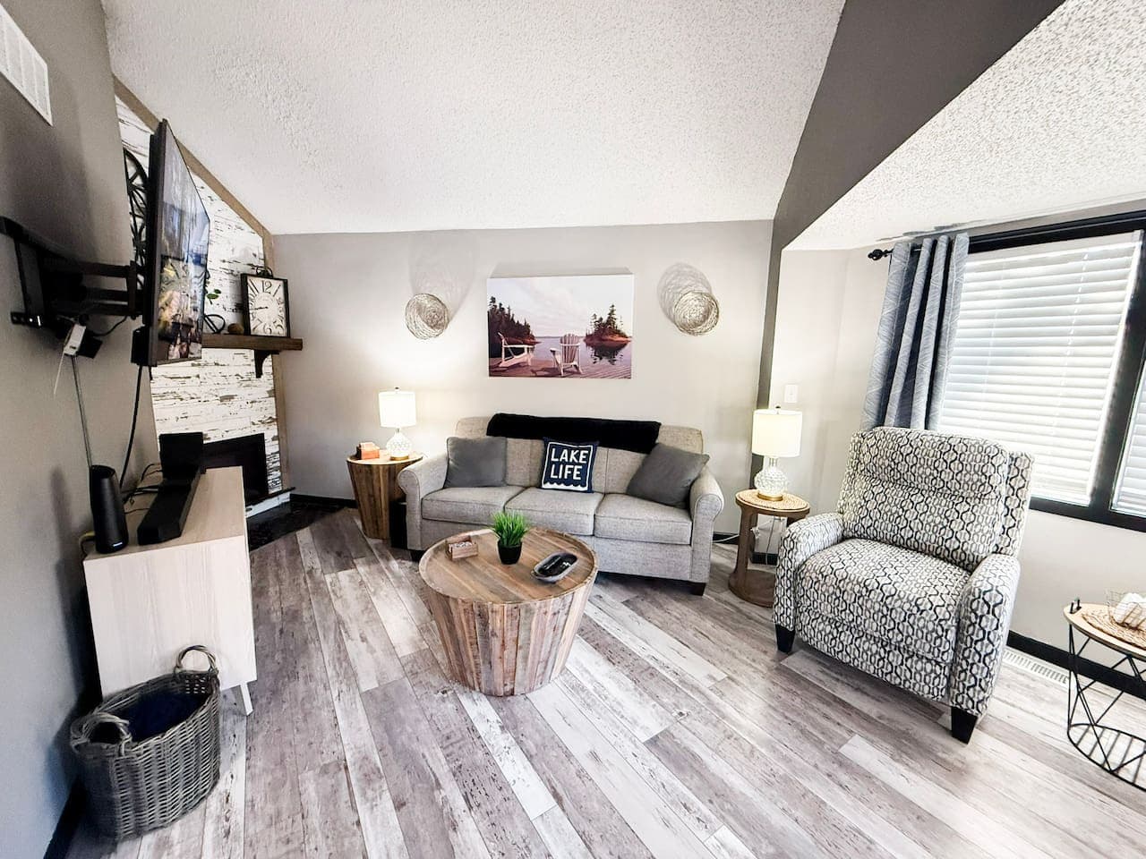 Stylish living room with fireplace and comfortable seating.