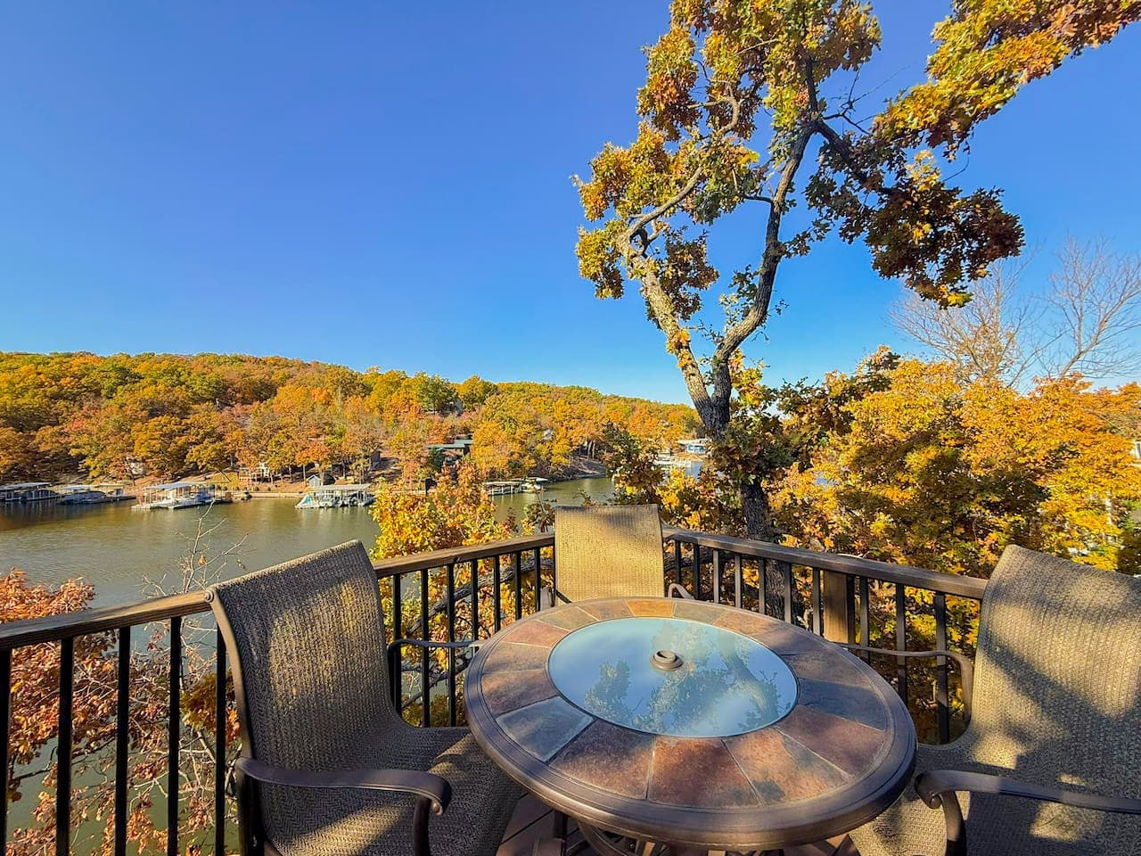Enjoy meals on the balcony overlooking the lake.