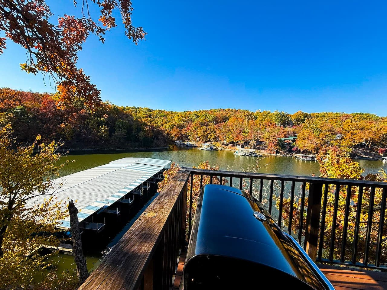 Private deck with BBQ grill and stunning lake views.
