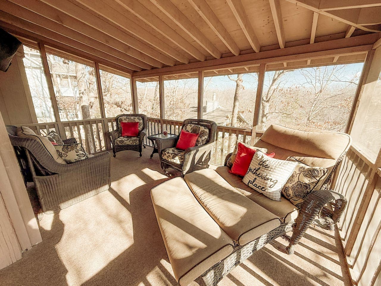 This inviting outdoor retreat offers comfy wicker furniture, refreshing breezes, and a serene nature backdrop. Ideal for guests seeking relaxation, fresh air, and cozy vacation vibes.