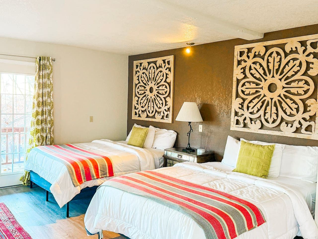 Wake up in a warm, thoughtfully designed space featuring cozy double beds and charming accent details.
Ideal for families and travelers seeking comfort, value, and a beautifully maintained stay.