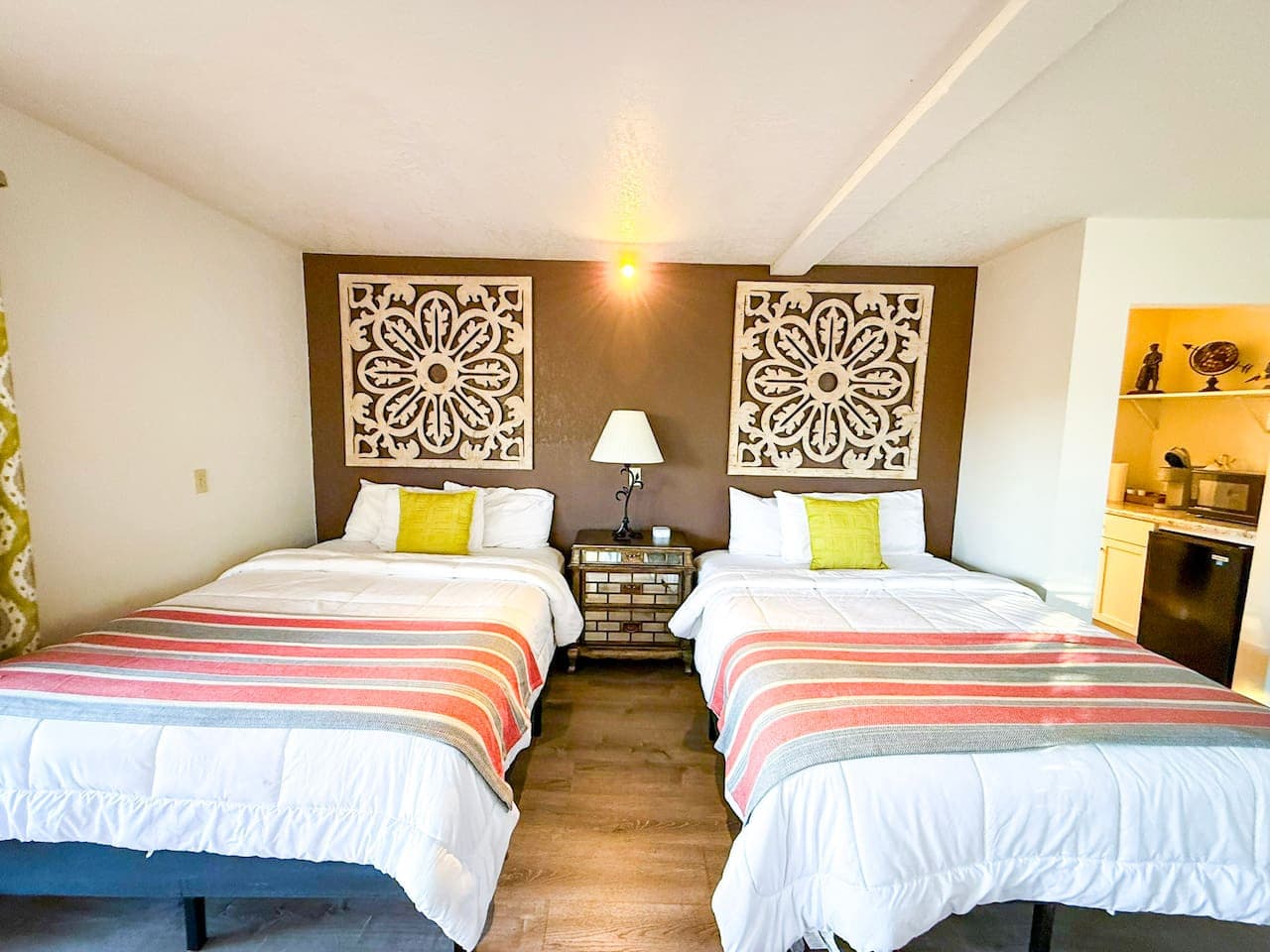 Charming, sunlit room with two plush beds, warm accent décor, and a calming, modern ambiance.
Perfect for families and small groups seeking comfort, convenience, and a relaxing home base near local attractions.