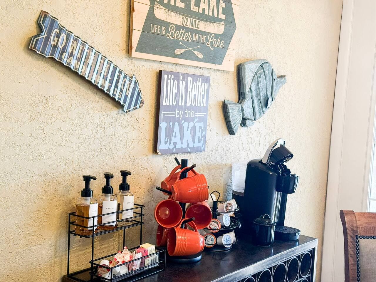 Enjoy a charming coffee nook stocked with a Keurig, mugs, and a variety of brews—perfect for starting your mornings right.