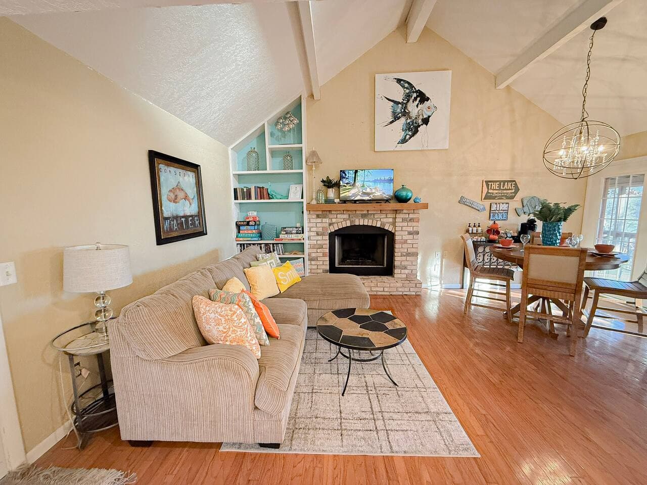Gather in a spacious living room with plush seating, warm wood floors, and a cozy fireplace.
A perfect family-friendly Airbnb near the lake, dining, and local attractions.