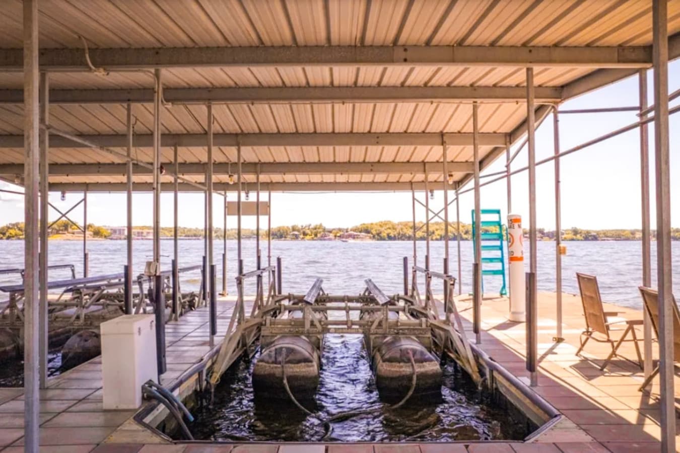 Enjoy direct access to the lake with your own covered boat slip—perfect for effortless days on the water, from sunrise cruises to sunset adventures. Your boating getaway starts right here.