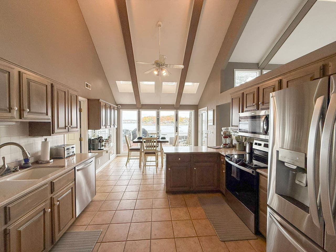 Bright, fully equipped kitchen with lakeview dining.