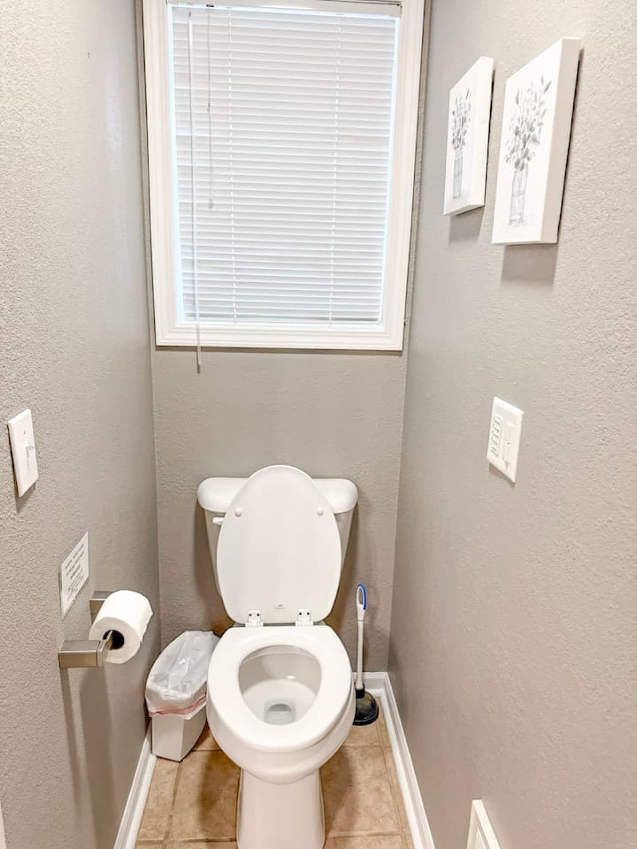 Clean, private toilet room with natural light.