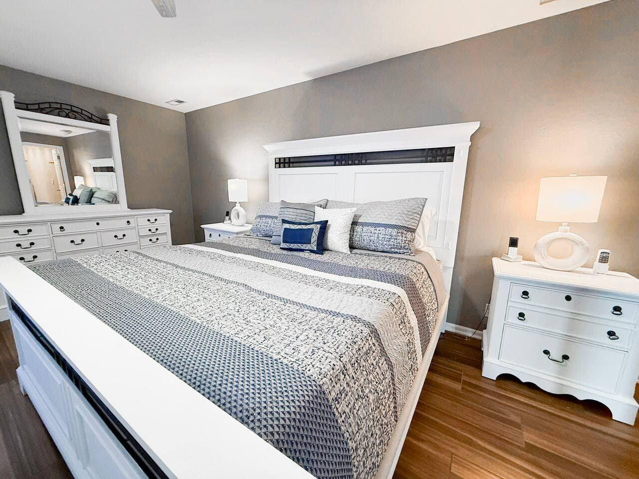 Inviting primary bedroom with king bed.