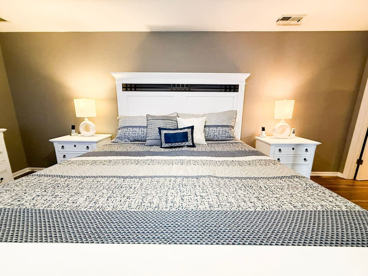 Comfortable master bedroom with king bed.