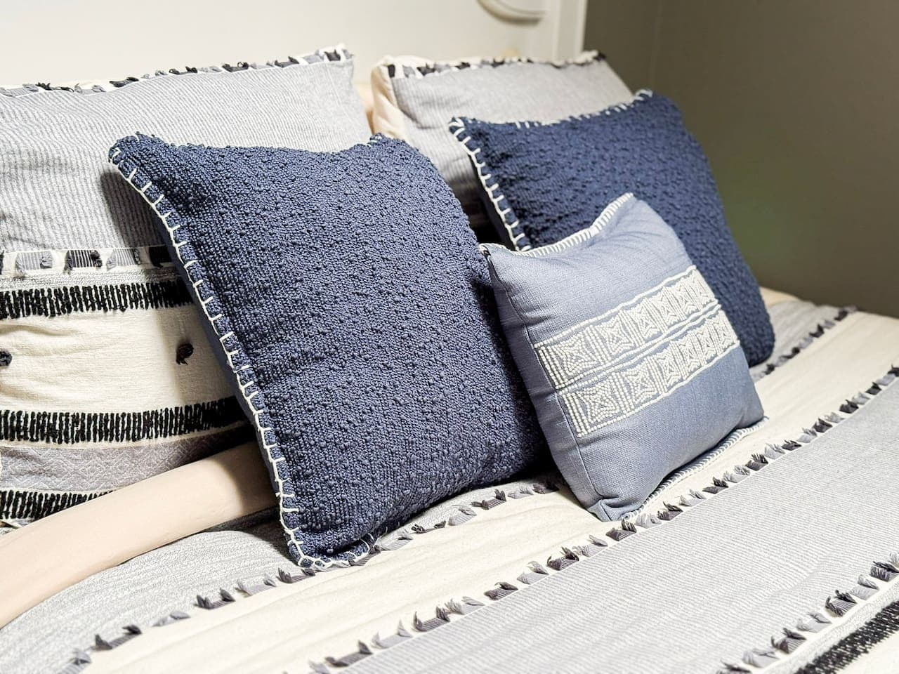 Stylish blue and white decorative pillows.