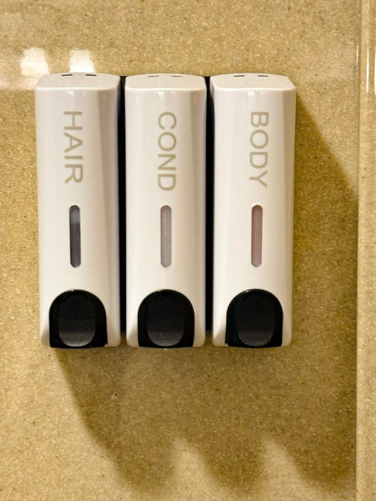 Convenient shampoo, conditioner, and body wash dispensers.