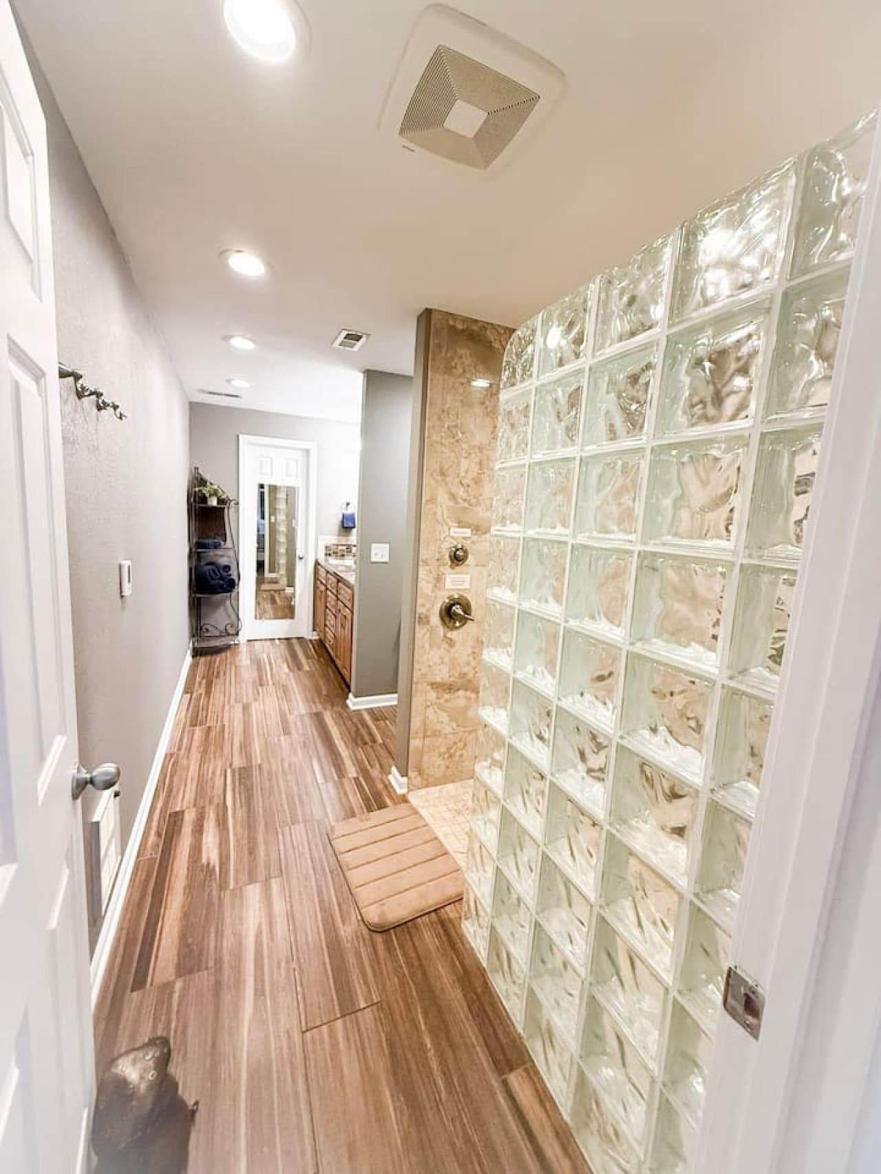 Modern bathroom with a spacious glass block shower.