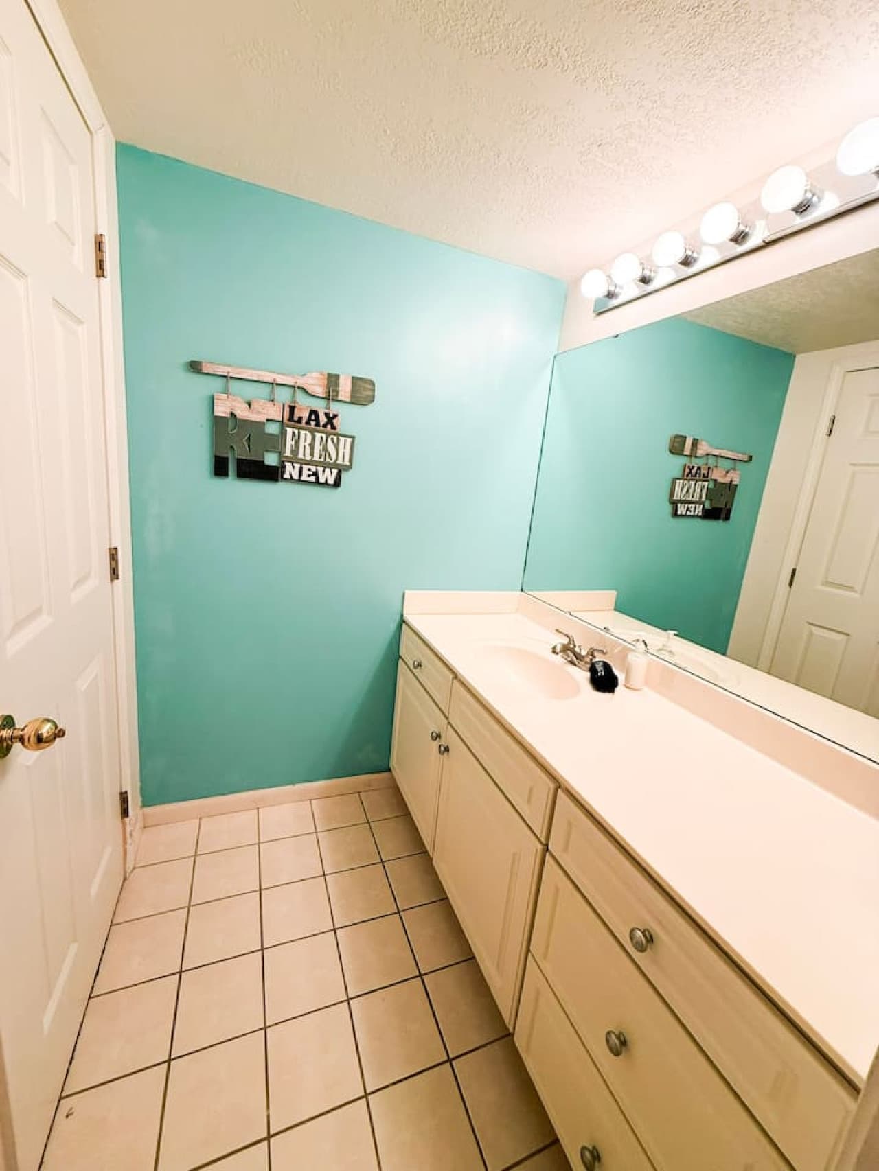 Fresh, spacious bathroom with a large vanity and bright, clean design—perfect for getting ready with ease.