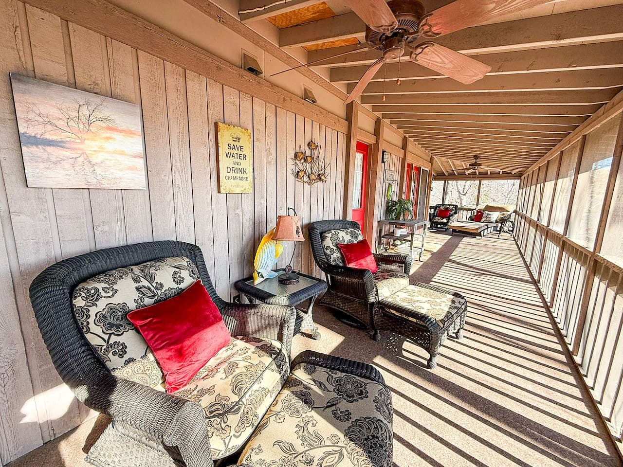 Relax in a breezy, sunlit porch surrounded by tranquil woodland views and cozy coastal-inspired seating. Ideal for guests seeking calm, comfort, and a soothing place to unwind.